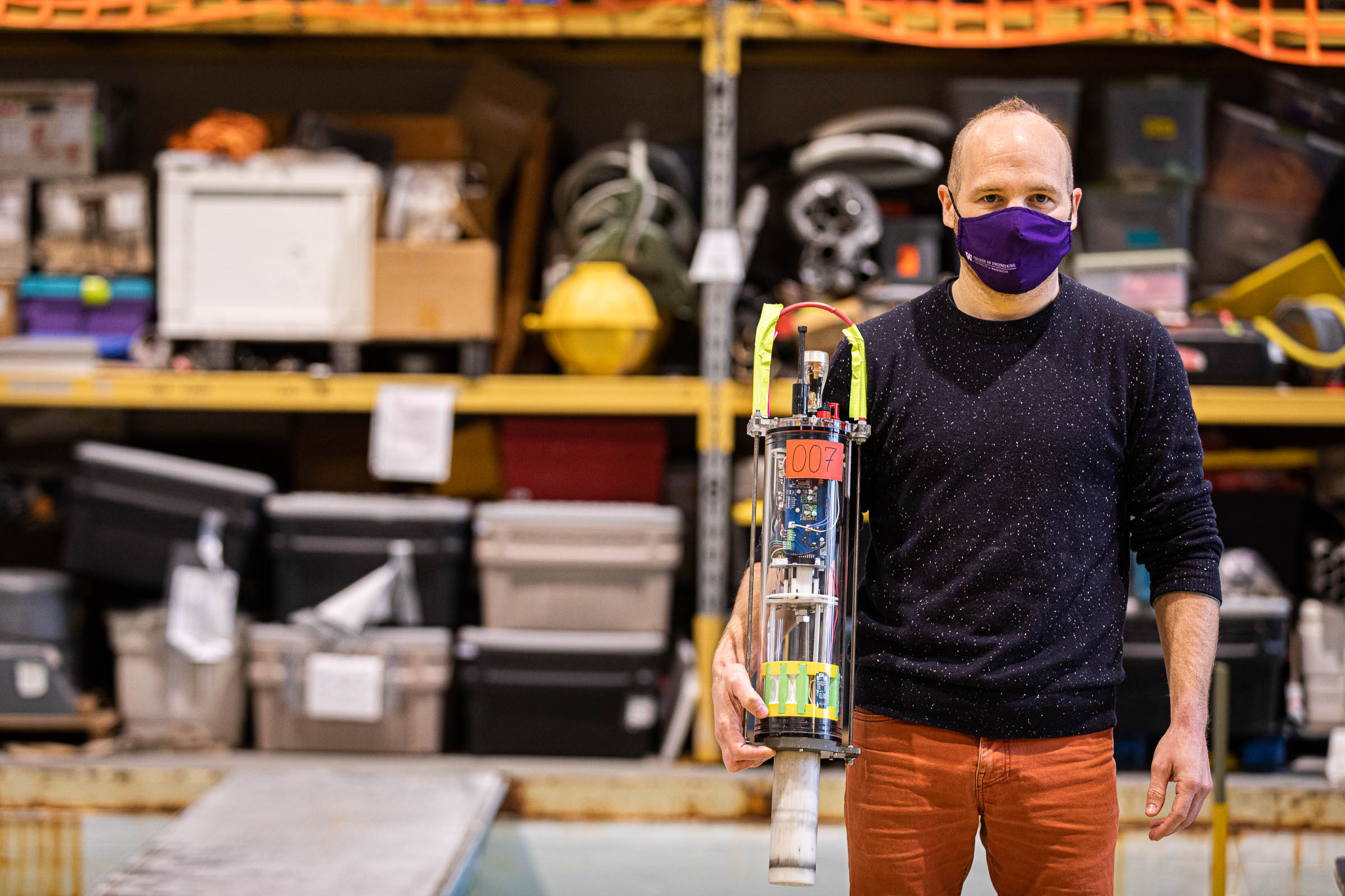 Trevor Harrison holding a µFloat with his hand