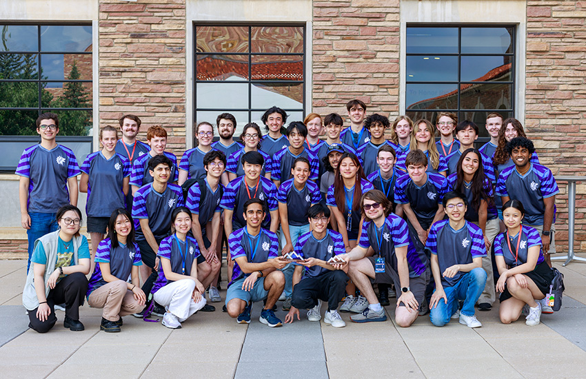 A group of students on the Advanced Robotics at UW team wearing matching shirts.