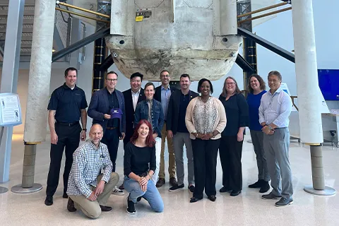 A group of External Advisory Board members at the Blue Origin facility in Florida.