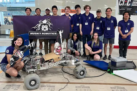 The Husky Robotics team posing with their robot